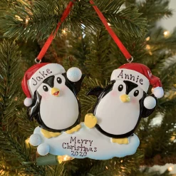 Penguin Couple Throwing Snowballs Personalized Christmas Ornament OR1318