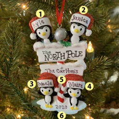 Penguin Family Of 4 At The North Pole Personalized Christmas Ornament OR1739-4